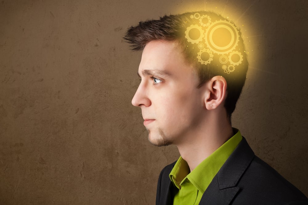 Young person thinking with a glowing machine head illustration