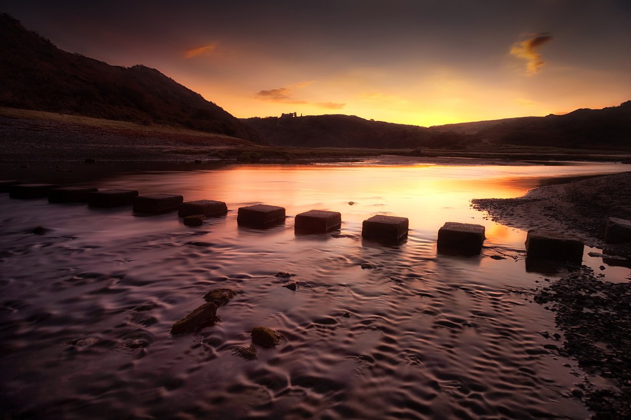 stepping stones in calm lake